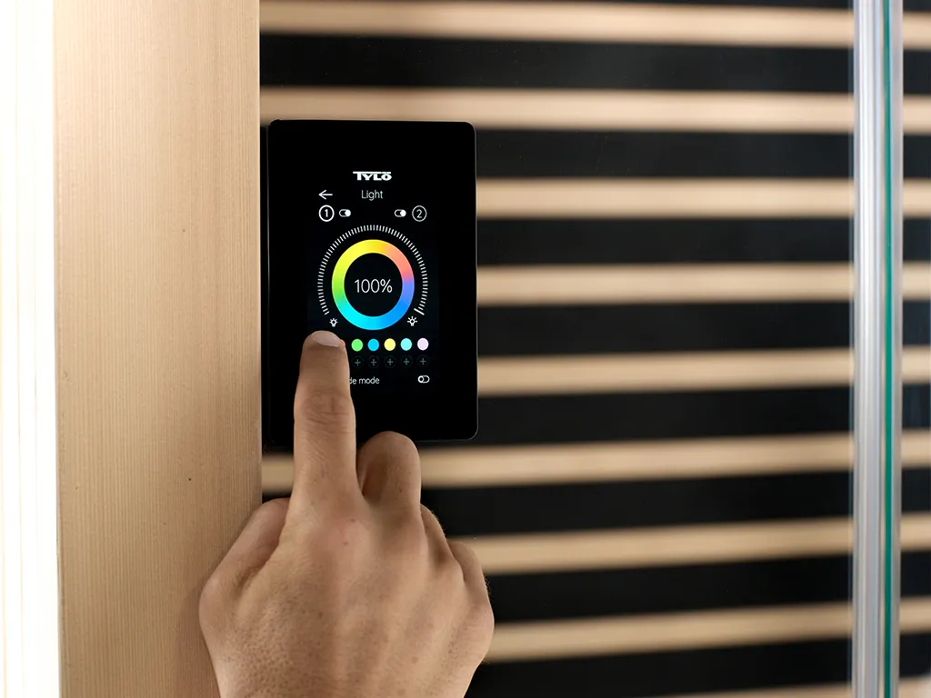 A close up of the Tylo Kiruna Hybrid sauna light feature